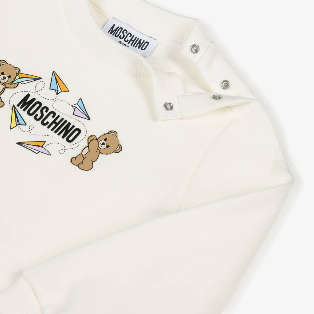 Moschino-Ivory Cotton Tracksuit with Teddy Bears & Paper Planes | Childrensalon
