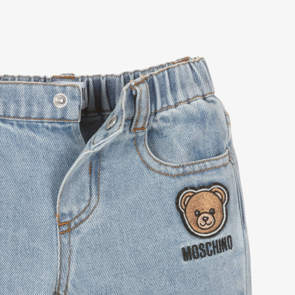 Moschino-Light Blue Wash Denim Jeans with Teddy Patch | Childrensalon