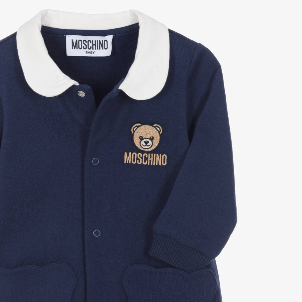 Moschino-Navy Blue Cotton Jersey Babygrow with Teddy Shaped Pockets | Childrensalon