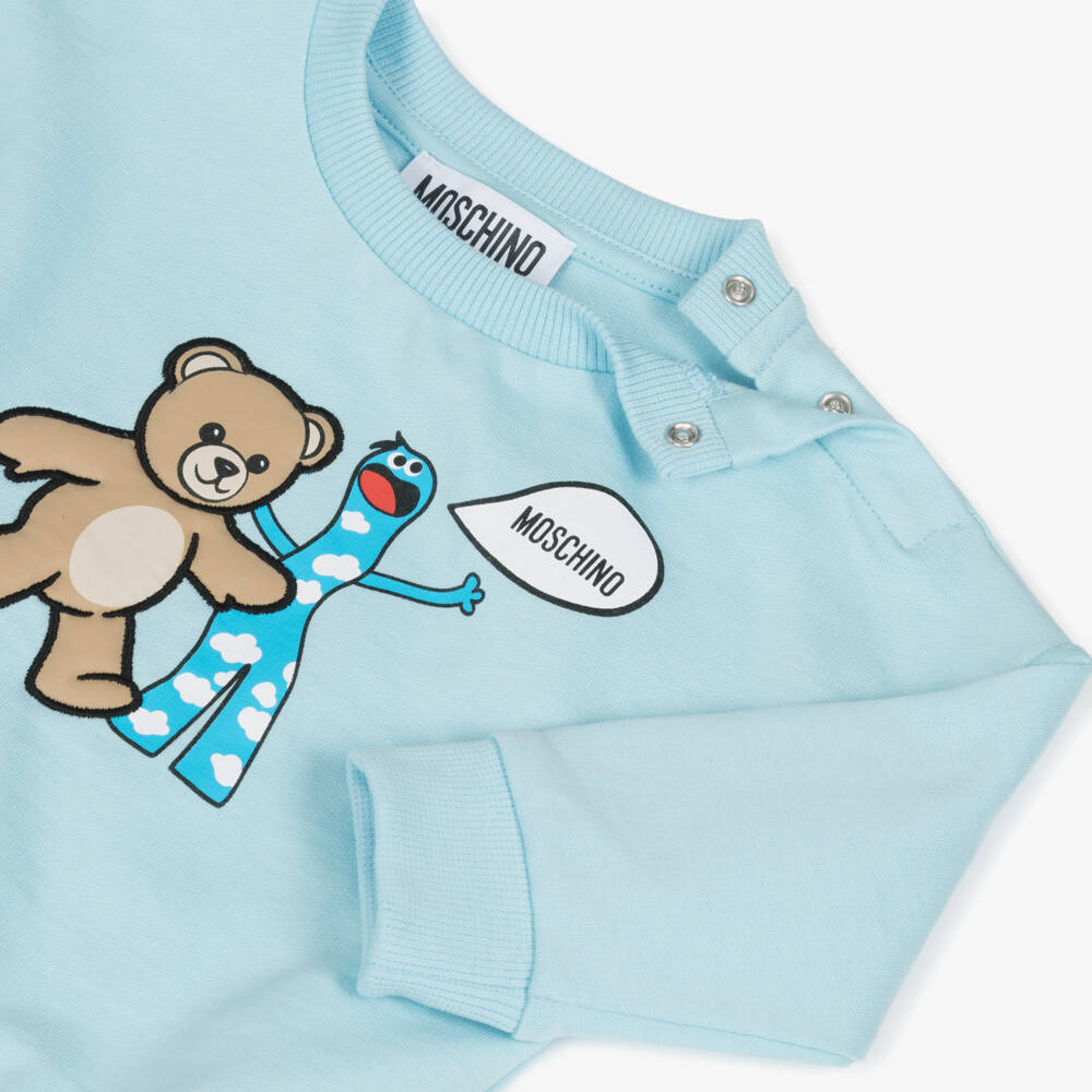 Moschino-سويتشيرت بطبعة وحش ودب قطن لون أزرق فاتح | Childrensalon