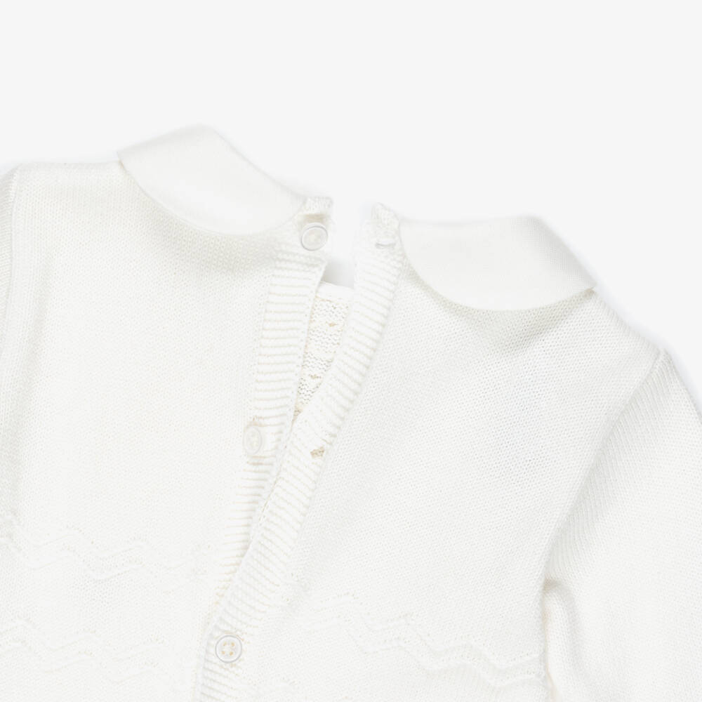 PAZ Rodríguez-Ivory Cotton Knit Babygrow with Knot Stitch Detail  | Childrensalon