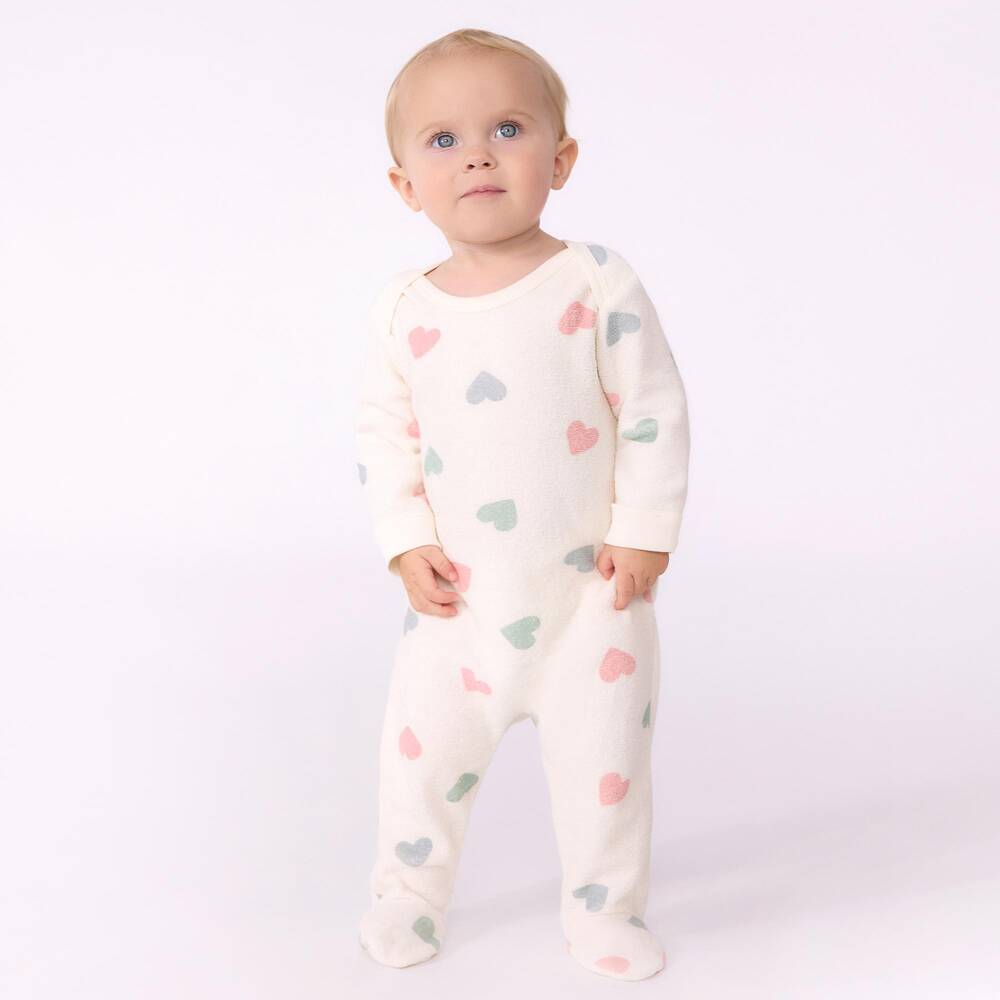 Petit Bateau-Girls Ivory Towelling Babygrow with Envelope Neckline | Childrensalon