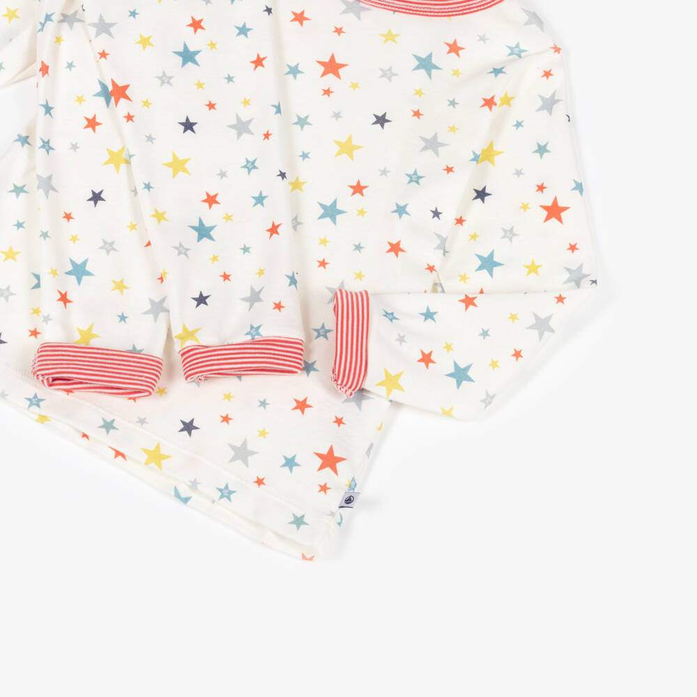 Petit Bateau-Ivory Cotton Long Pyjamas with Colourful Stars | Childrensalon