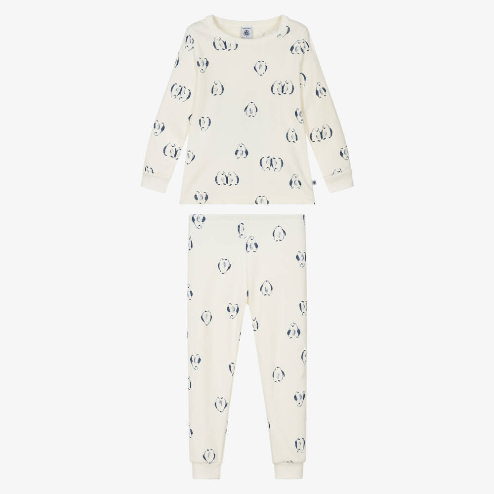 Petit Bateau-Ivory Cotton Pyjamas with Navy Blue Penguin Print | Childrensalon
