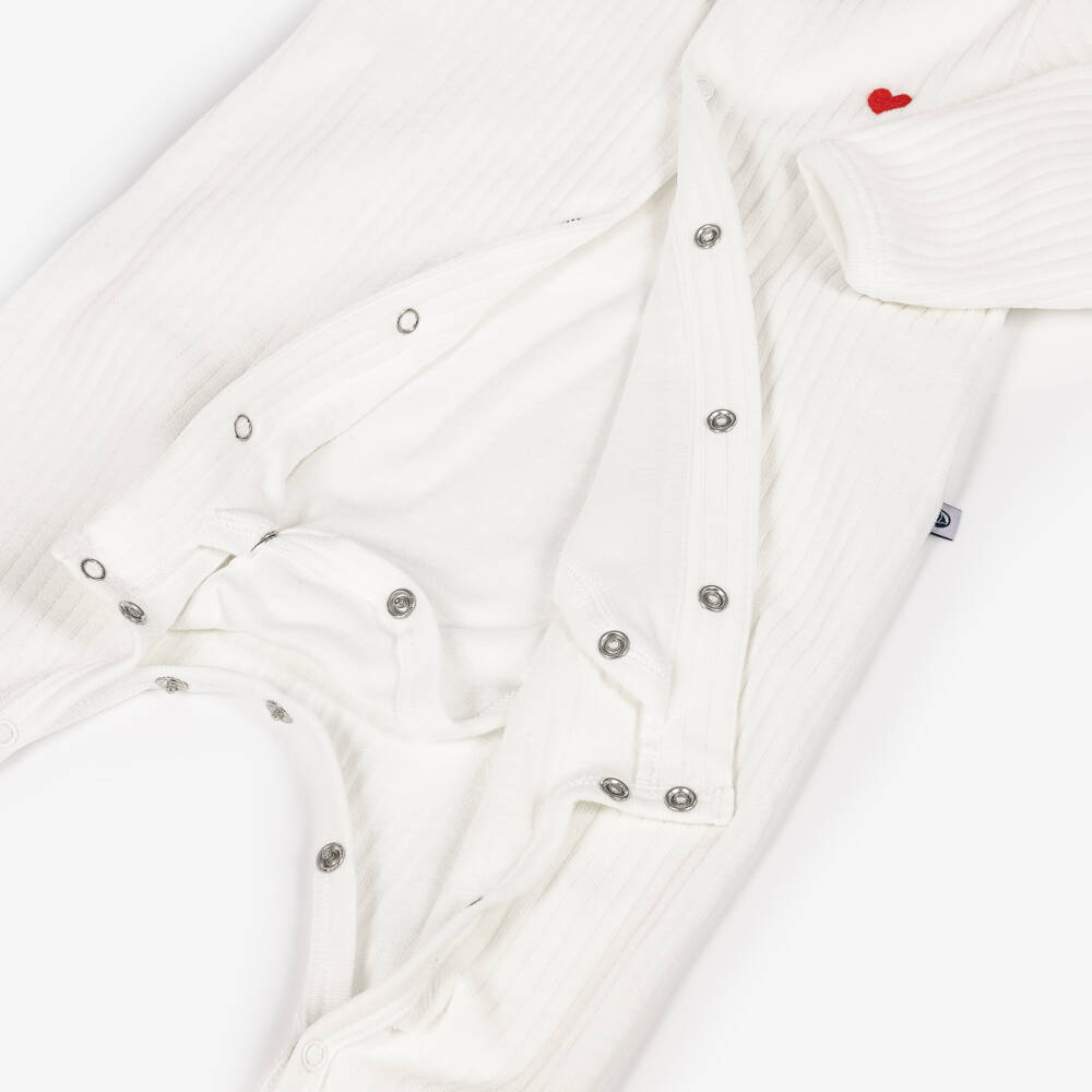 Petit Bateau-Ivory Ribbed Velour Babygrow with Heart Detail | Childrensalon