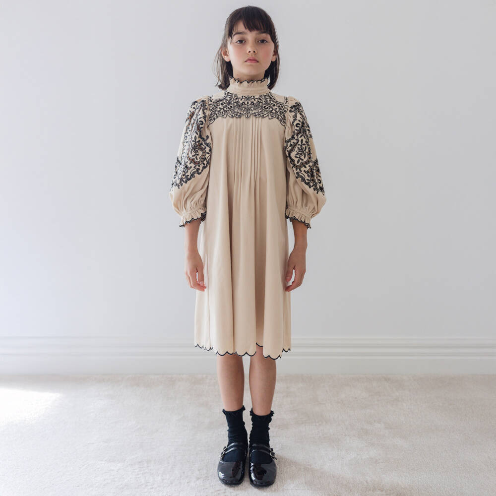 Petite Amalie-Girls Beige Needlecord Dress with Black Cutwork & Embroidery | Childrensalon