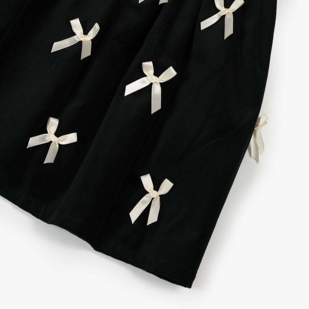 Phi Clothing-فستان بنات مخمل لون أسود بفيونكات ساتان لون عاجي | Childrensalon