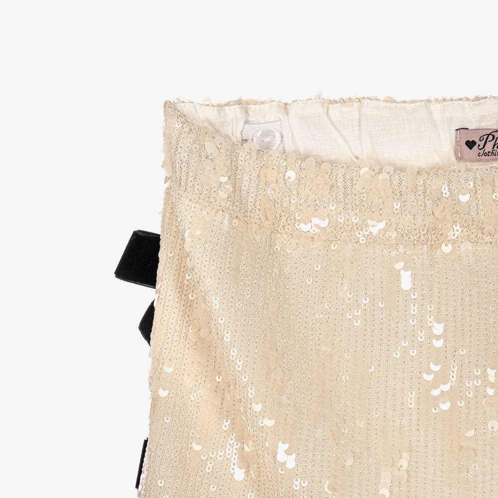 Phi Clothing-Girls Ivory Sequin Skirt With Black Velvet Bows | Childrensalon