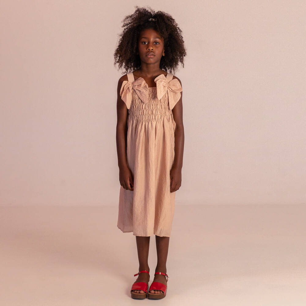 RaspberryPlum-Girls Pink Crinkled Fabric Dress with Bows | Childrensalon