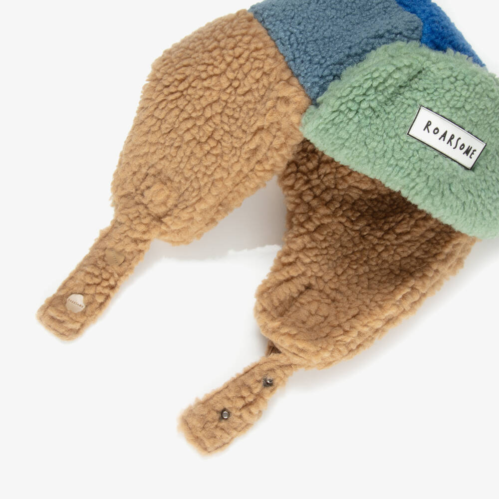 Roarsome-Шапка-траппер синяя из шерпа-флиса с цветоблоками | Childrensalon