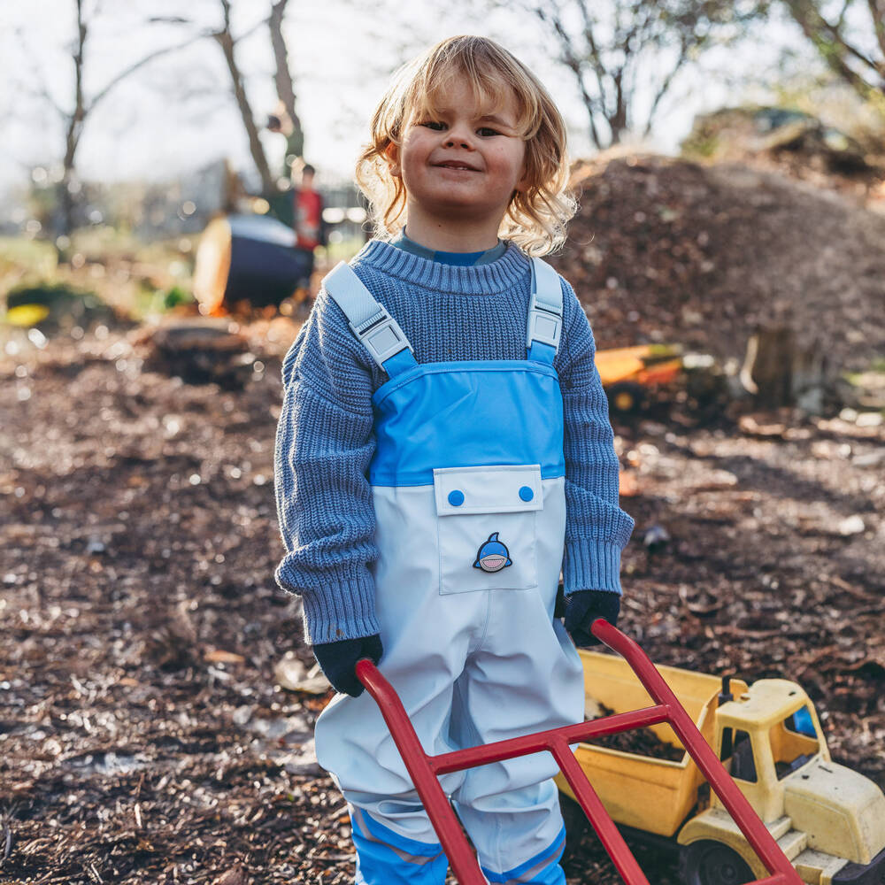 Roarsome-بنطلون واقي من المطر لون أزرق للأولاد | Childrensalon