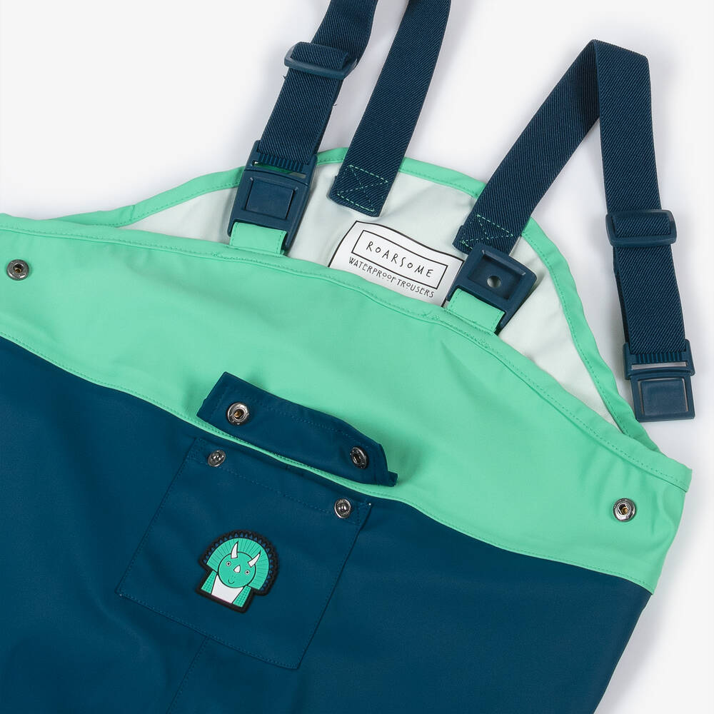 Roarsome-بنطلون واقي من المطر لون أخضر وأزرق للأولاد | Childrensalon