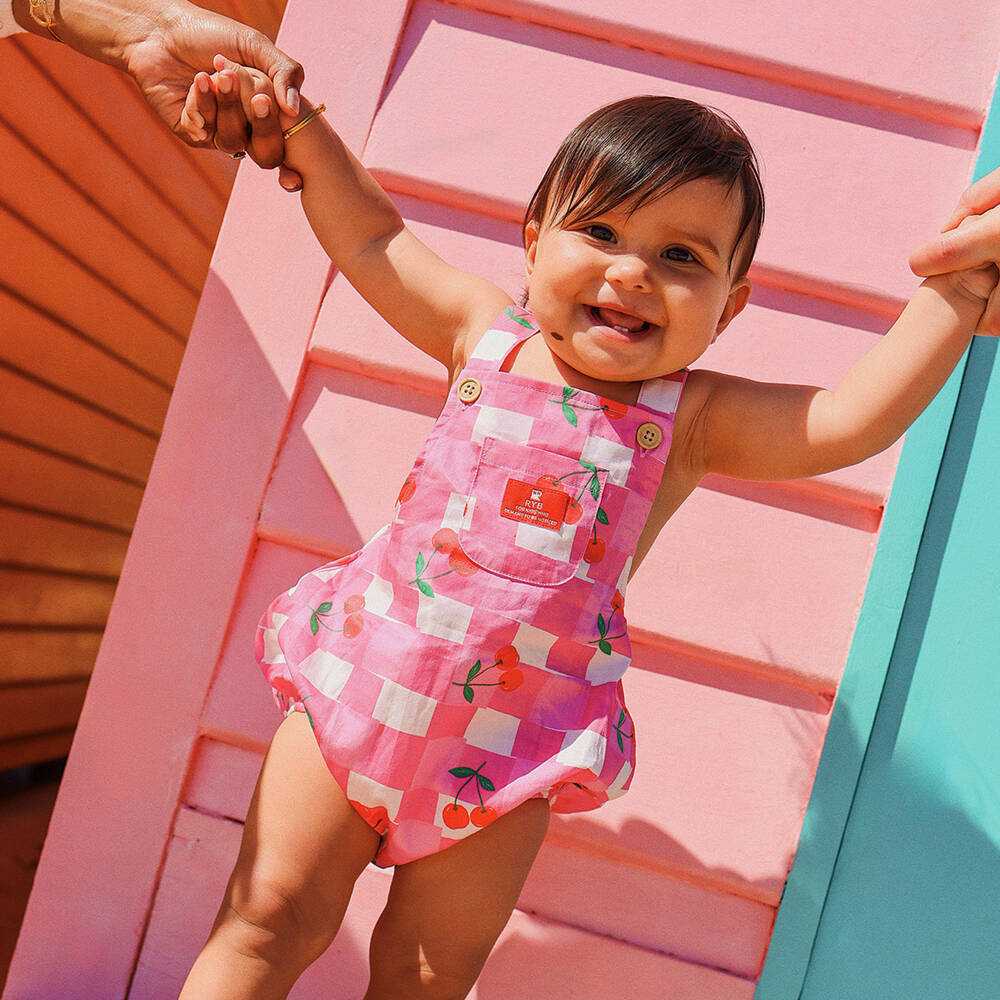 Rock Your Baby-بودي سوت بنقشة كرز لون زهري للبنات الرضع | Childrensalon