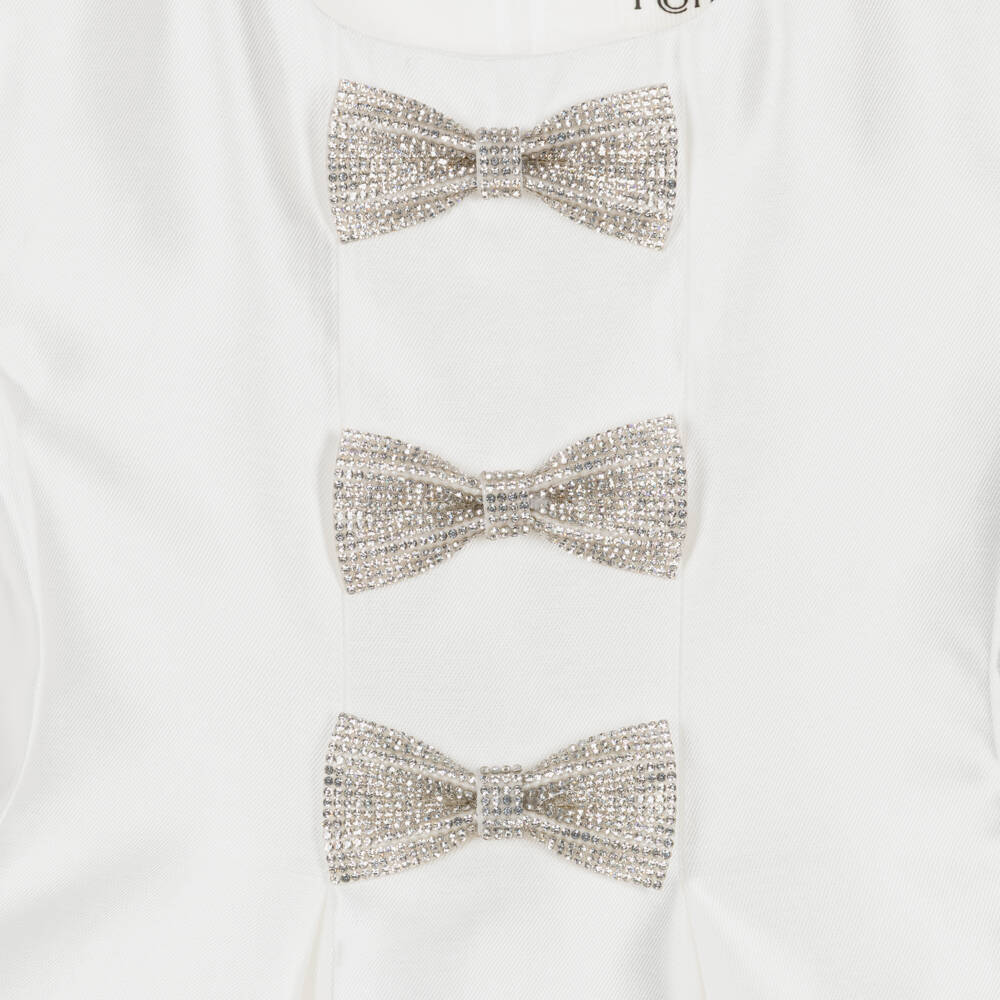 Romano-فستان ساتان مزين بفيونكات مرصعة بالكريستال لون عاجي للبنات | Childrensalon