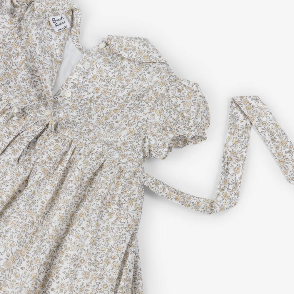 Sarah Louise-Girls White & Beige Floral Cotton Hand-Smocked Dress | Childrensalon