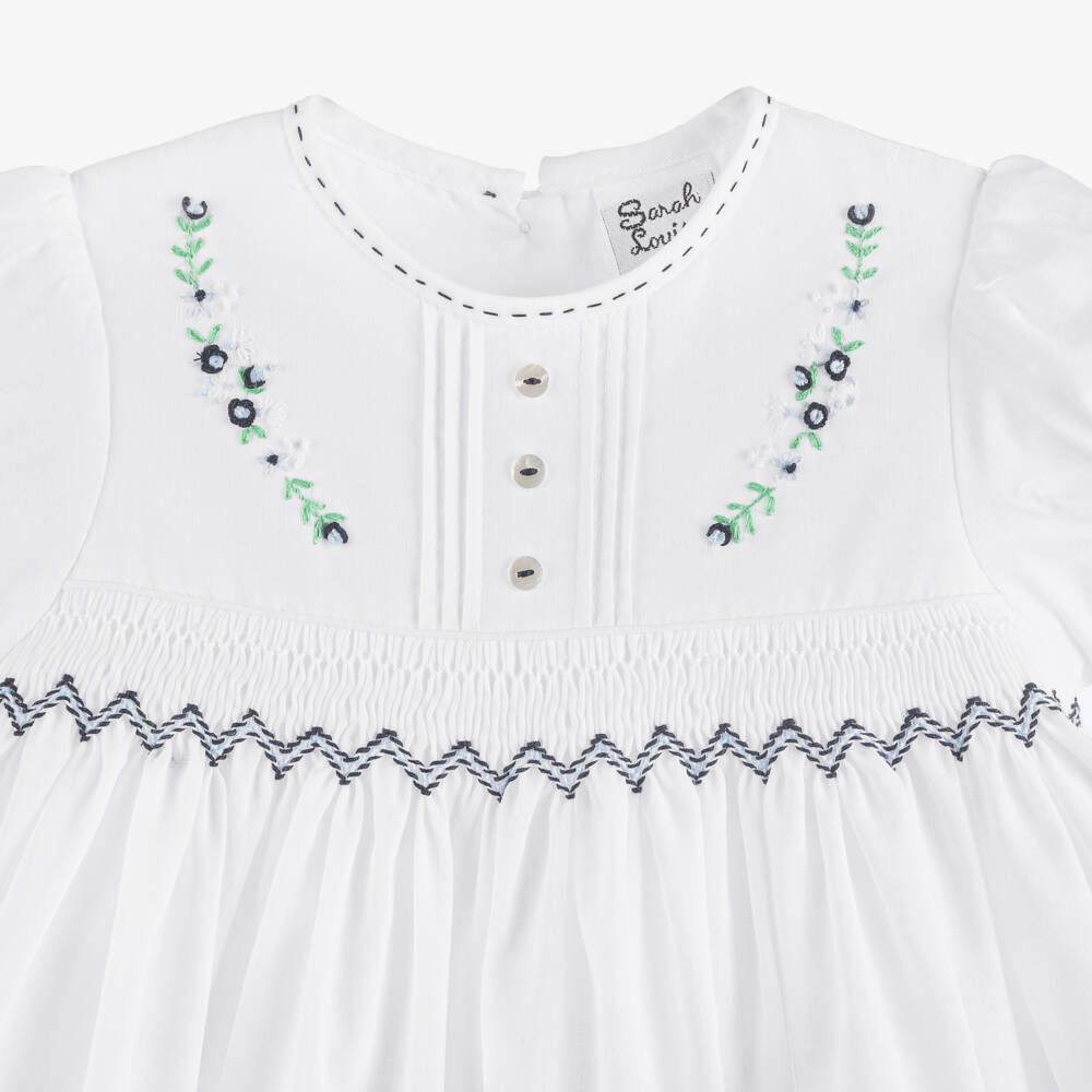 Sarah Louise-Girls White & Navy blue Smocked Dress | Childrensalon