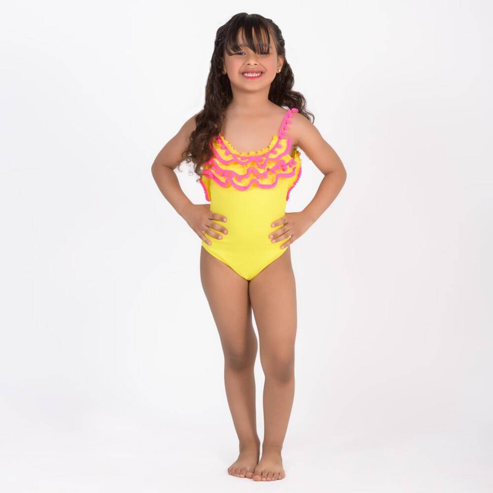 Selini Action-Girls Yellow Swimsuit with Pink Pom-Pom Trims | Childrensalon