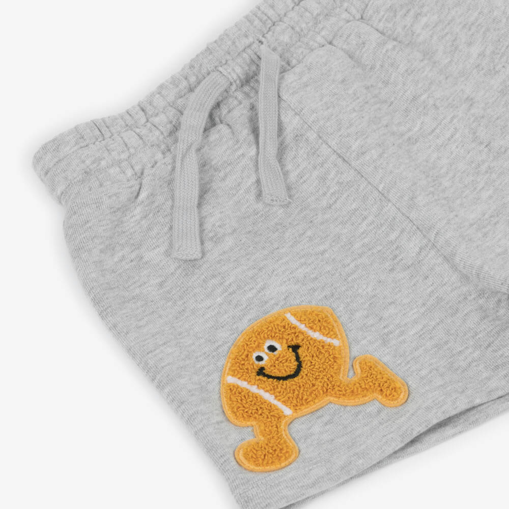 Stella McCartney Kids-Серые шорты из хлопка с нашивкой регбийного мяча для девочек | Childrensalon