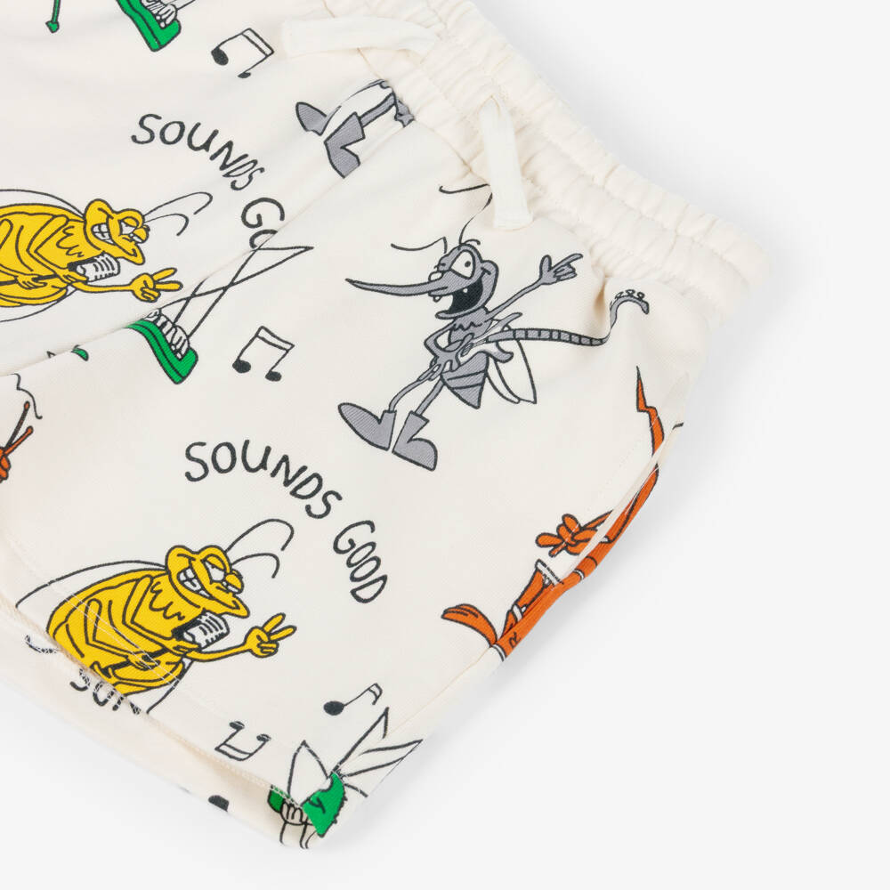 Stella McCartney Kids-Шорты кремовые хлопковые с принтом жуков-музыкантов для мальчиков  | Childrensalon