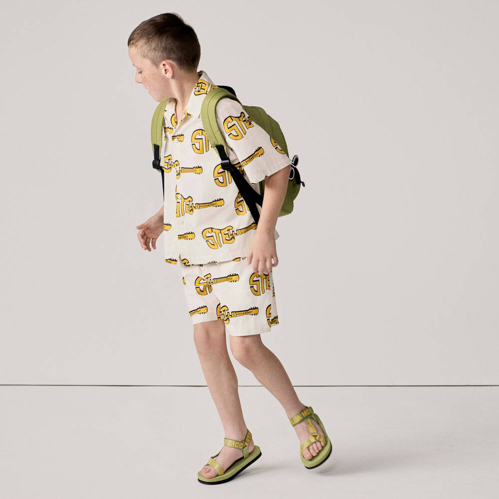 Stella McCartney Kids-شورت قطن بطبعة جيتار أصفر لون عاجي للأولاد | Childrensalon