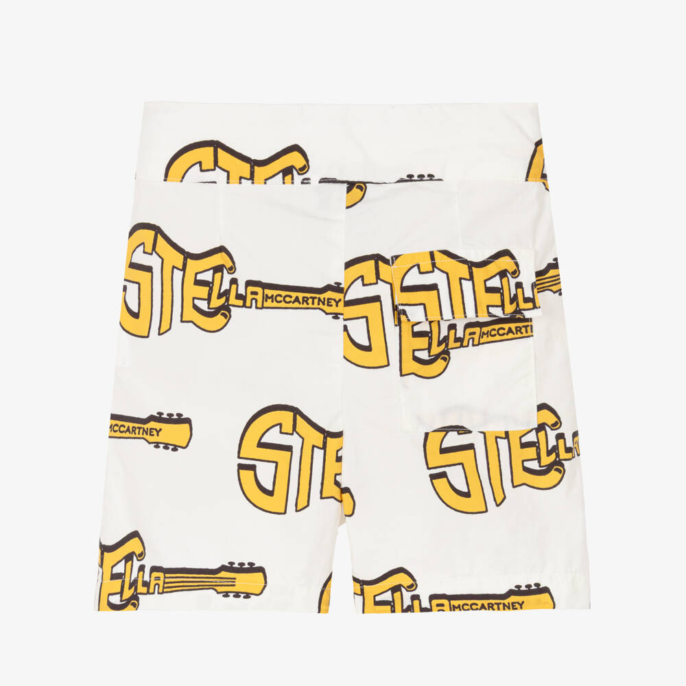 Stella McCartney Kids-Шорты кремовые хлопковые с жёлтыми гитарами для мальчиков | Childrensalon