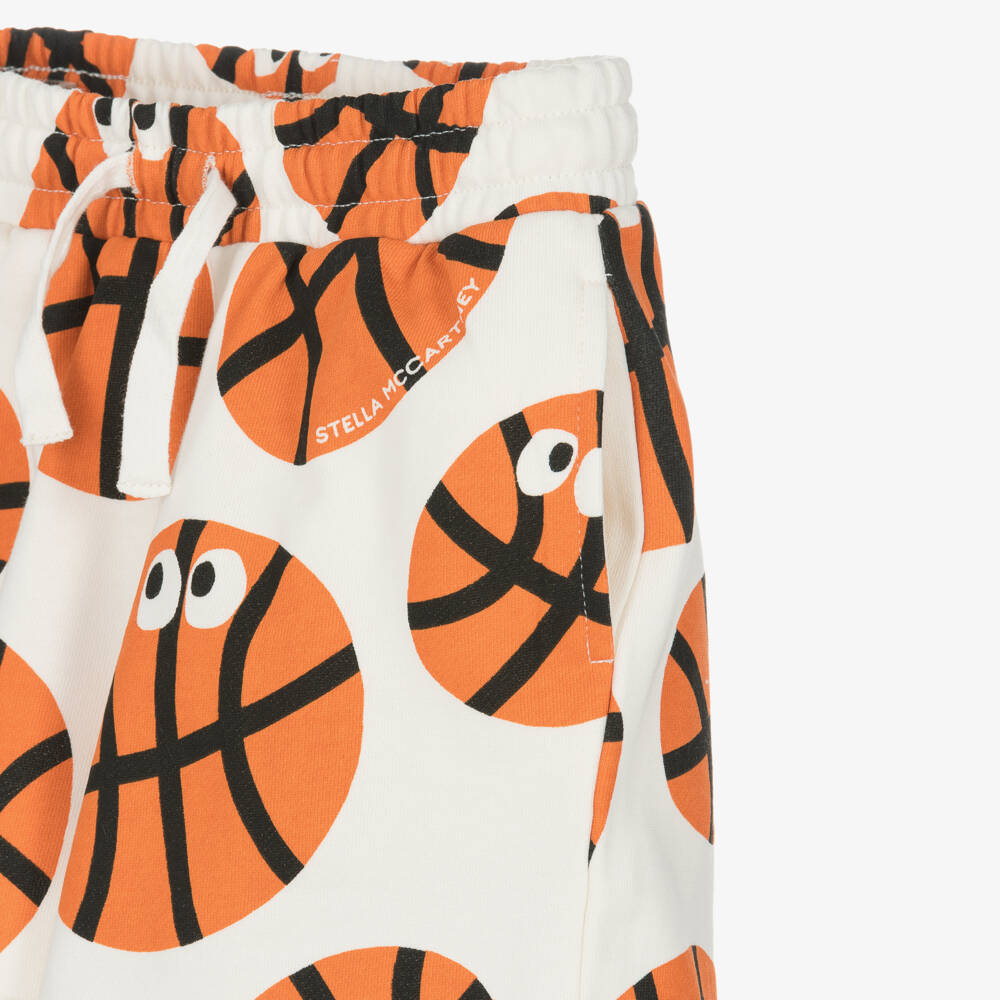 Stella McCartney Kids-Boys Ivory & Orange Basketball Print Shorts | Childrensalon