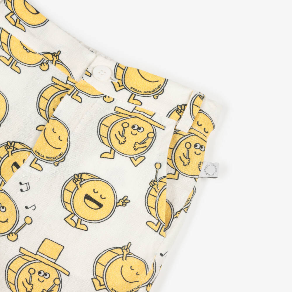 Stella McCartney Kids-شورت بطبعة طبول لون عاجي وأصفر للأولاد | Childrensalon