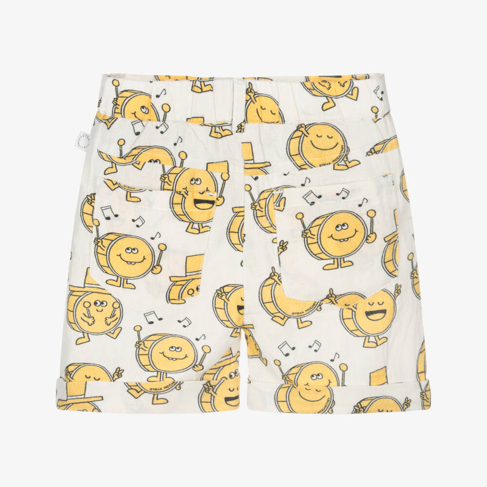 Stella McCartney Kids-شورت بطبعة طبول لون عاجي وأصفر للأولاد | Childrensalon