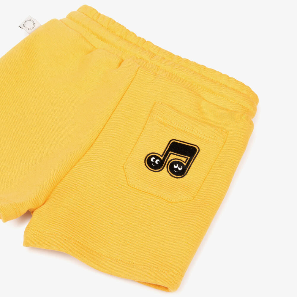 Stella McCartney Kids-شورت بطبعة نوتة موسيقية قطن لون أصفر للأولاد | Childrensalon