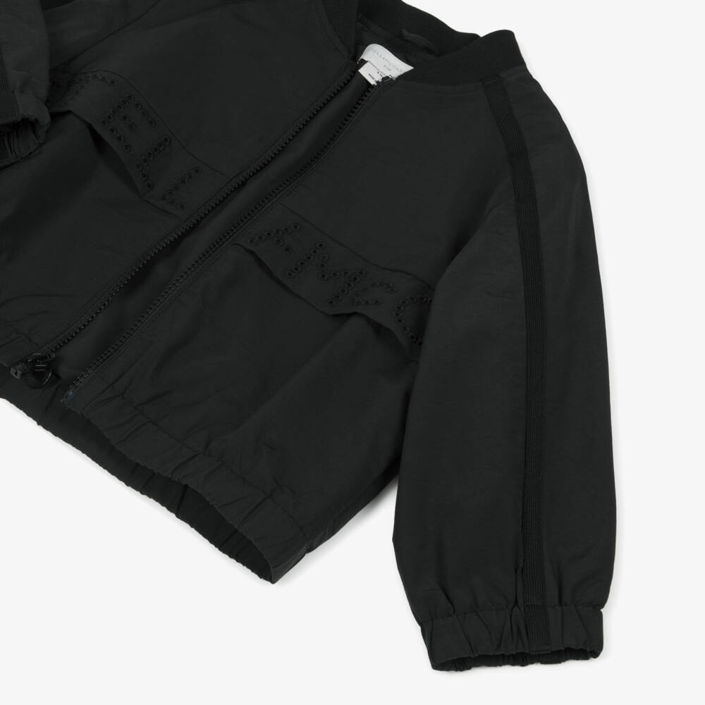 Stella McCartney Kids-Girls Black Bomber Jacker with Embroidered Perforated Logo | Childrensalon