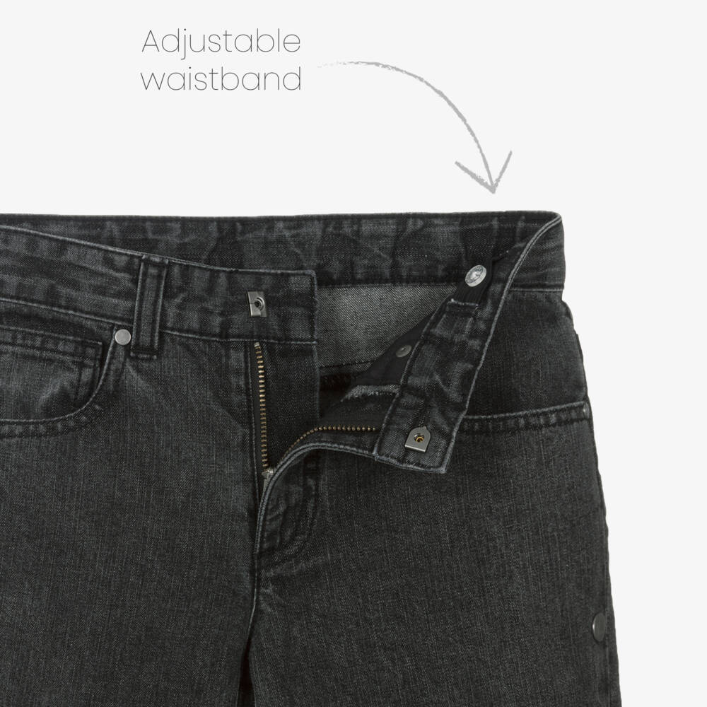 Stella McCartney Kids-جينز بتصميم واسع وأزرار كبس جانبية لون أسود للبنات | Childrensalon