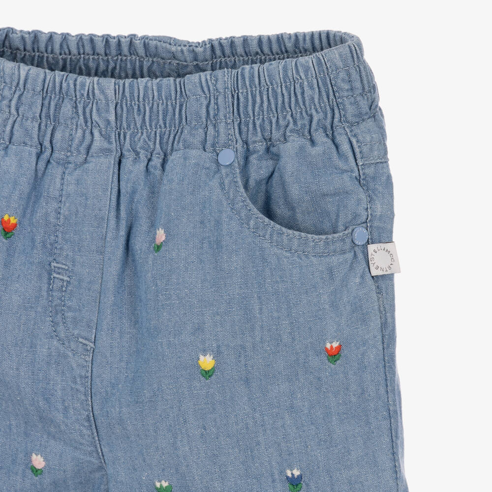 Stella McCartney Kids-Girls Blue Chambray Jeans with Embroidered Flowers | Childrensalon