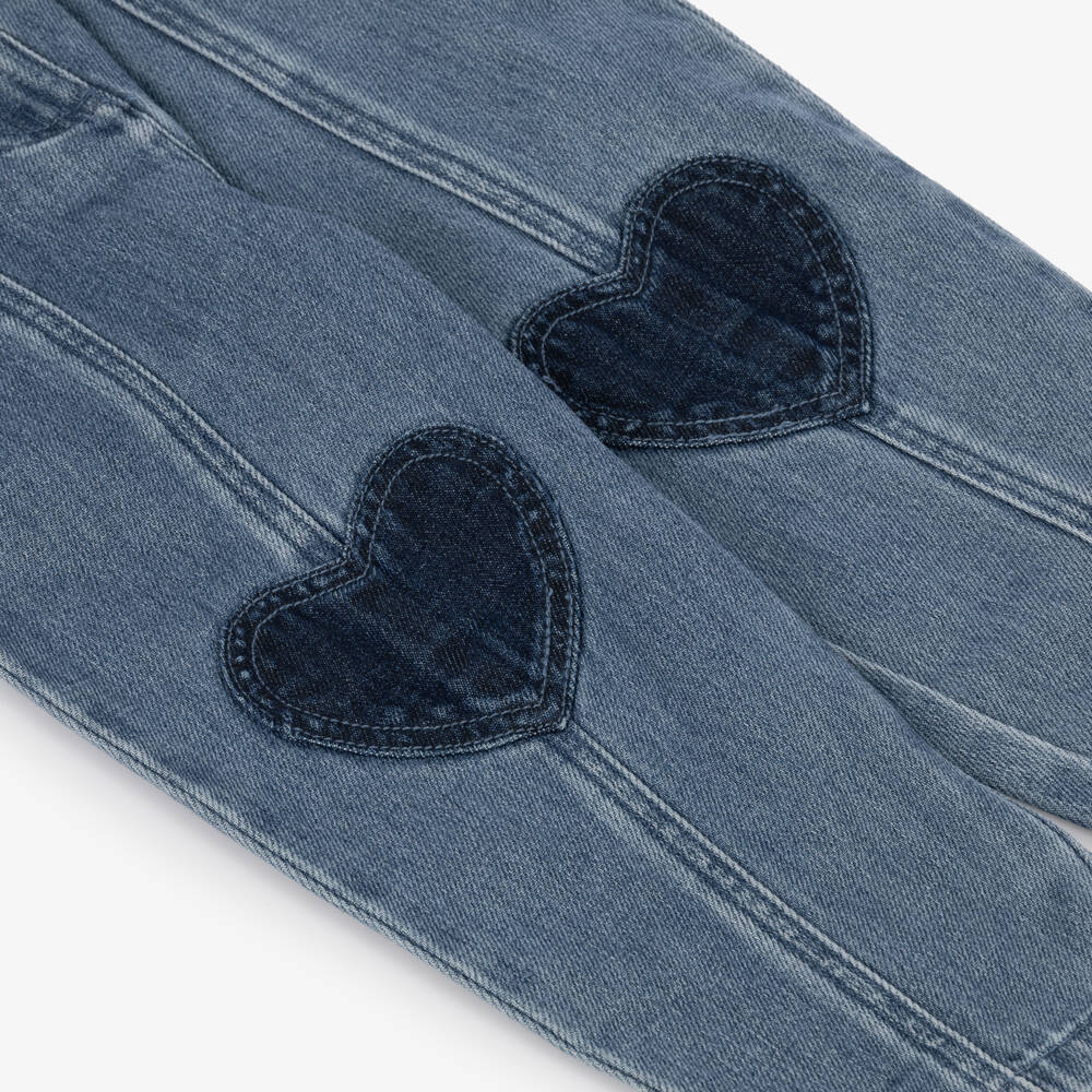 Stella McCartney Kids-Girls Blue Denim Jeans with Heart Motifs | Childrensalon