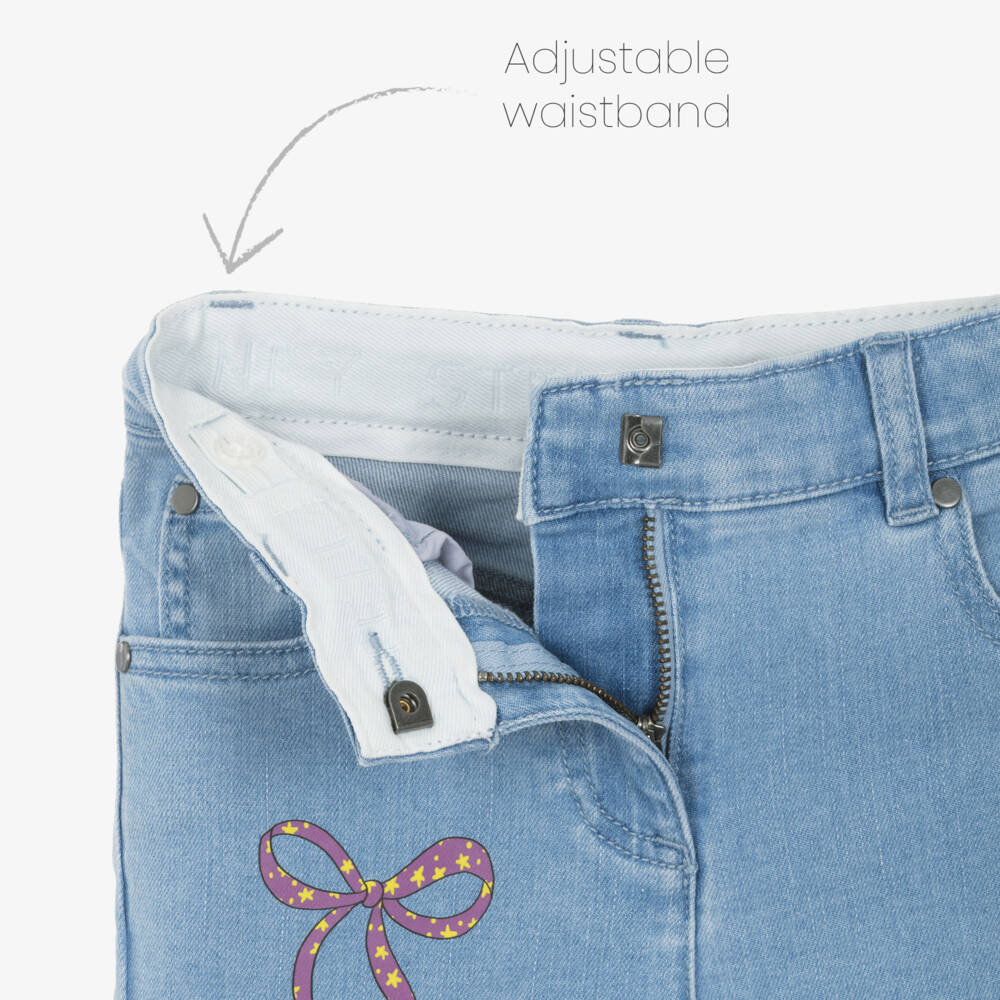 Stella McCartney Kids-Джинсы слим голубые из денима с принтом бантиков для девочек | Childrensalon