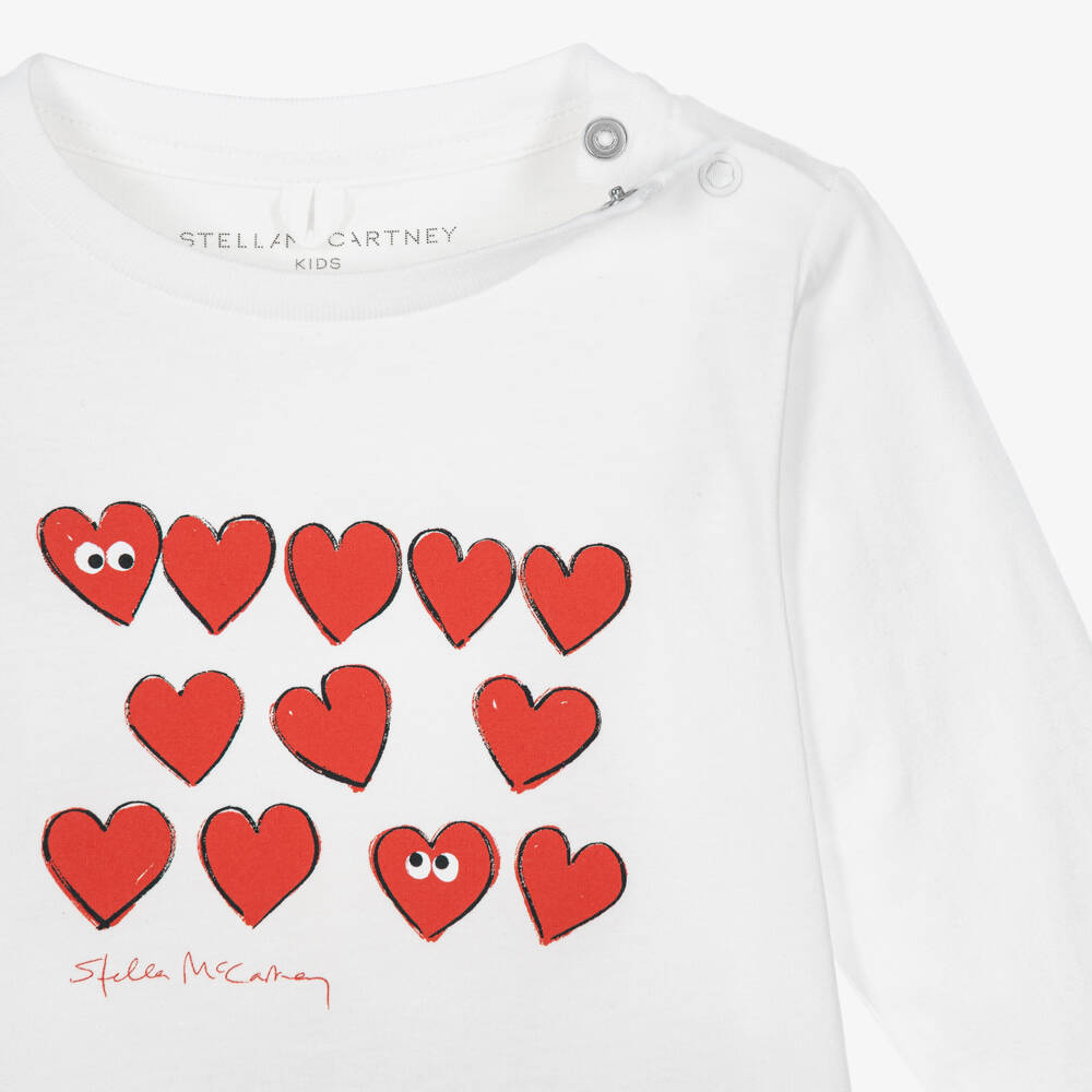 Stella McCartney Kids-Girls Ivory Cotton Top with Red Heart Print | Childrensalon