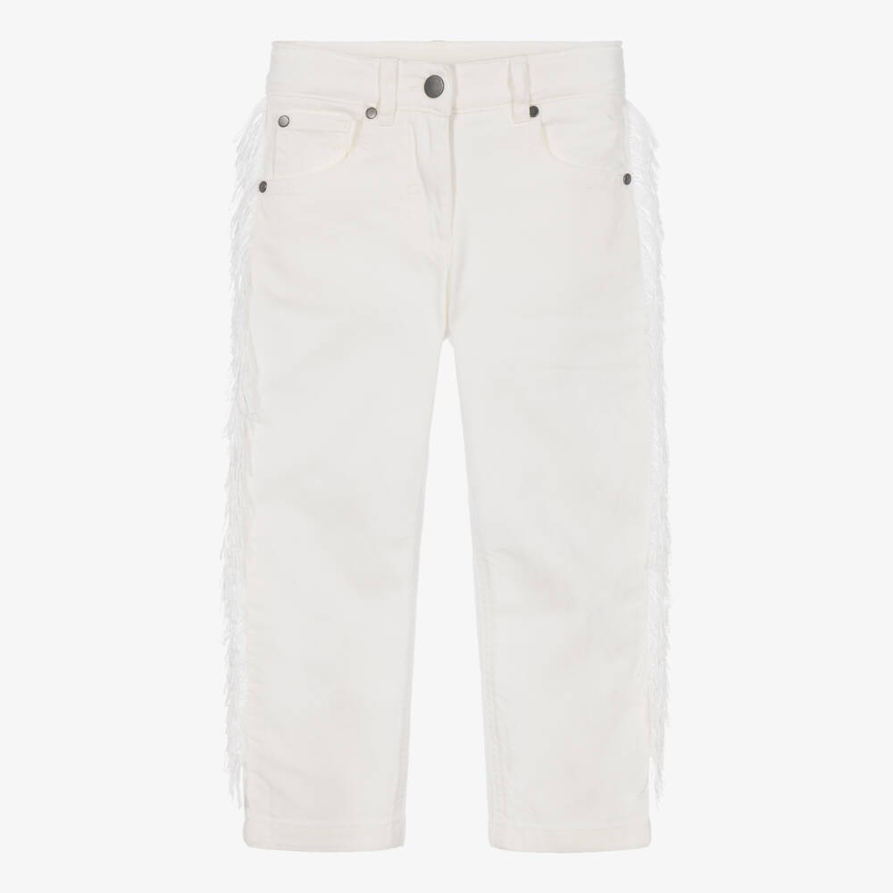 Stella McCartney Kids-Girls Ivory Denim Jeans with Fringe Trims | Childrensalon