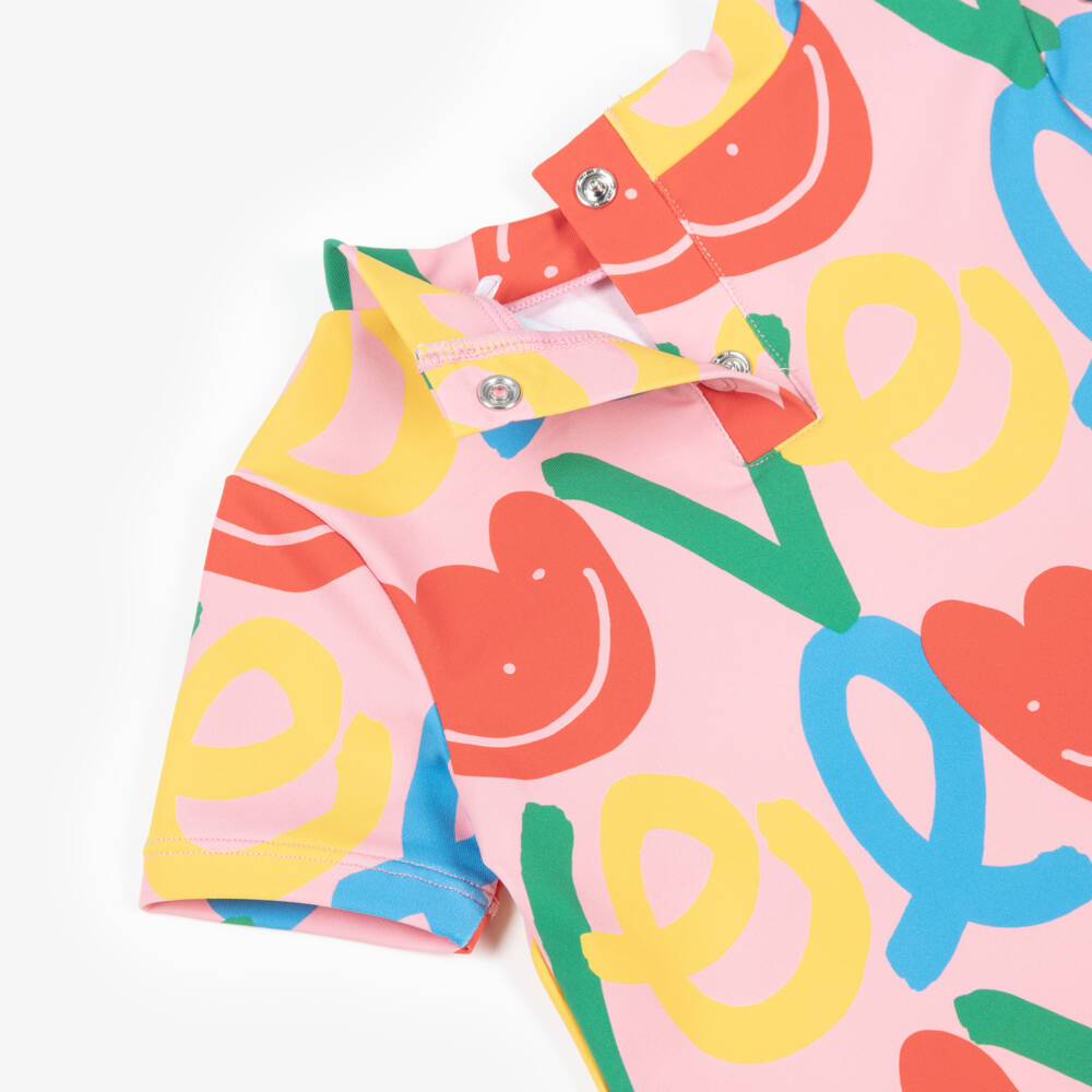 Stella McCartney Kids-بدلة واقية من الشمس لون زهري للبنات (UPF50+) | Childrensalon