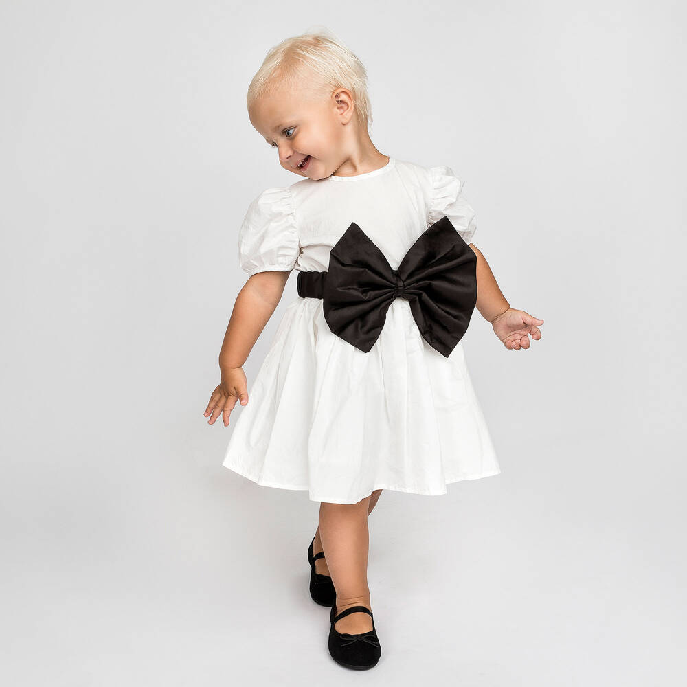 The Tiny Universe-Girls White Cotton & Black Bow Dress | Childrensalon