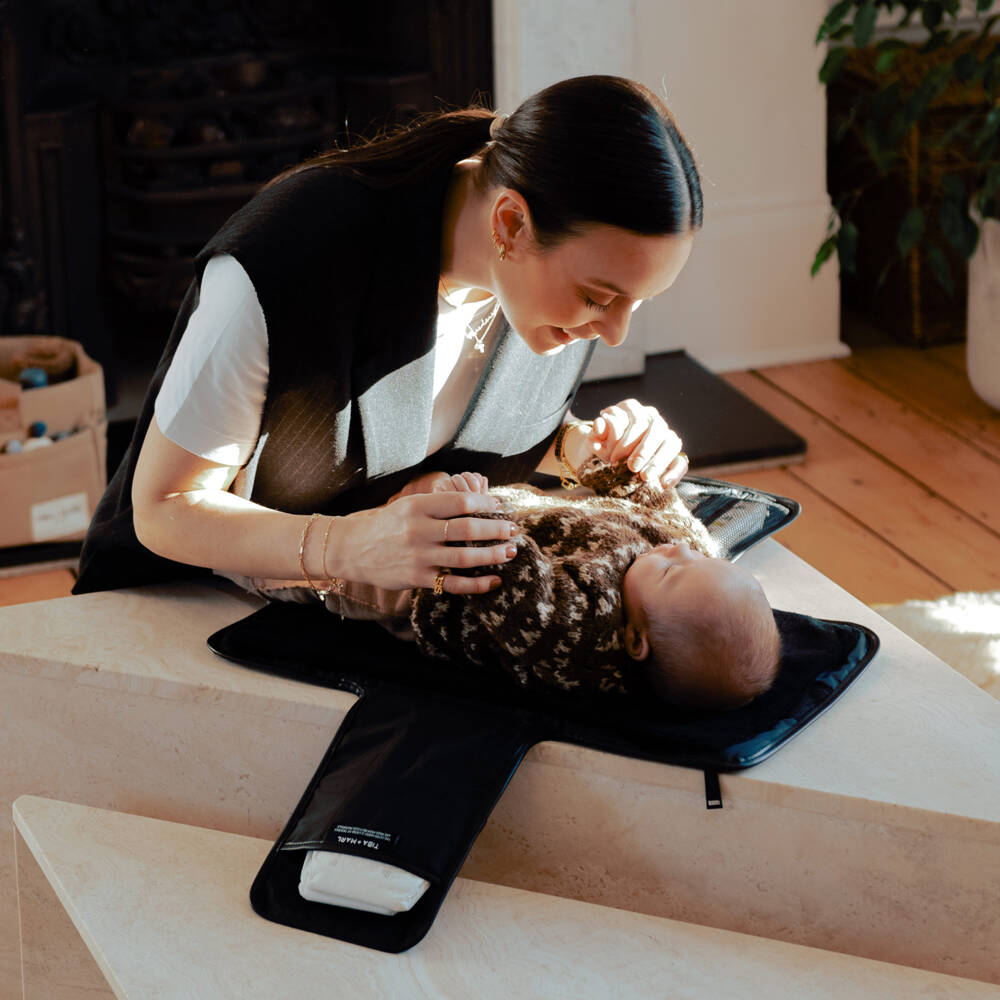 TIBA + MARL-Black Faux Leather Changing Mat Clutch (56cm) | Childrensalon