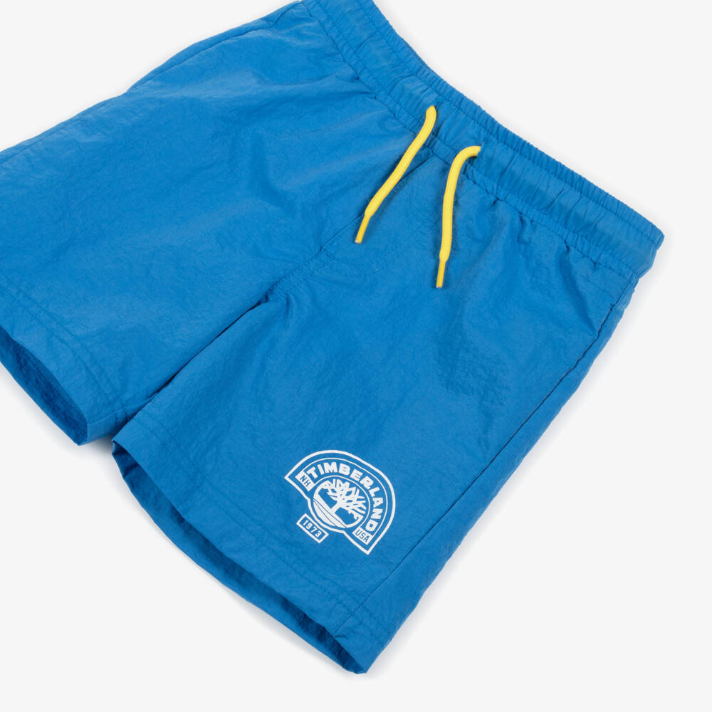 Timberland-Boys Blue Swim Shorts with White Logo Print | Childrensalon