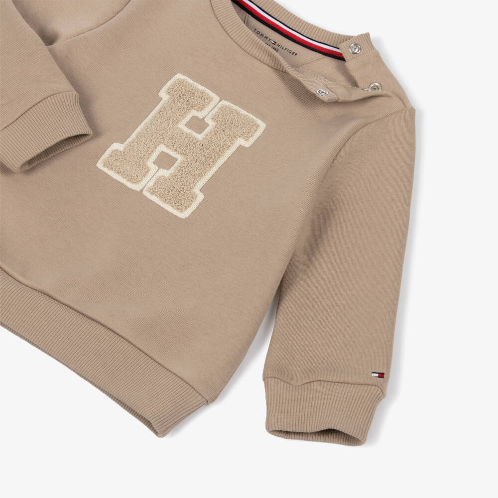 Tommy Hilfiger-سويتشيرت فارسيتي لون بيج للأولاد الرضع | Childrensalon