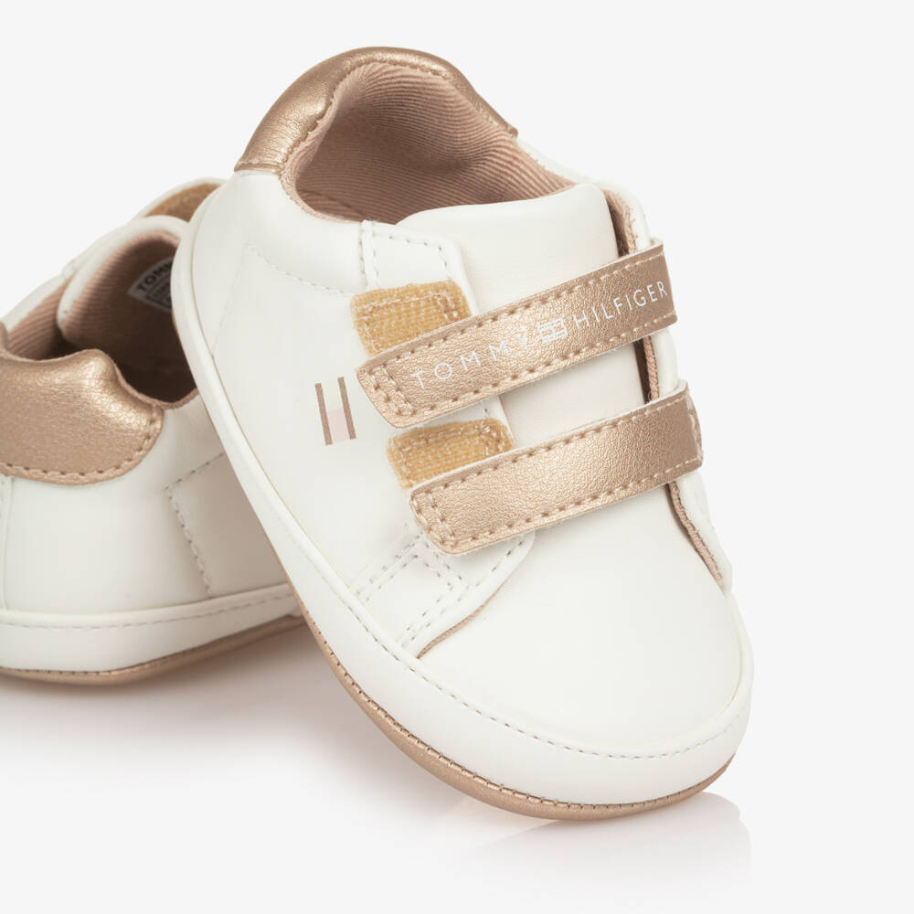 Tommy Hilfiger-Baby Girls Ivory & Gold Faux Leather Trainers | Childrensalon
