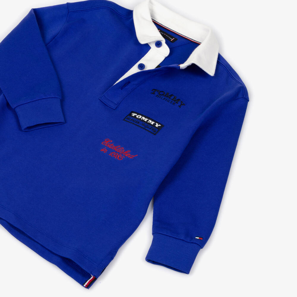 Tommy Hilfiger-Boys Blue Cotton Polo Shirt with Multiple Logos | Childrensalon