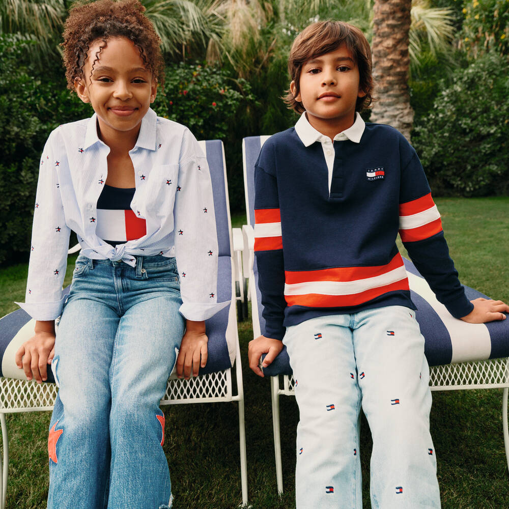 Tommy Hilfiger-Boys Navy Blue Cotton Rugby Shirt with Red Striped Trim | Childrensalon