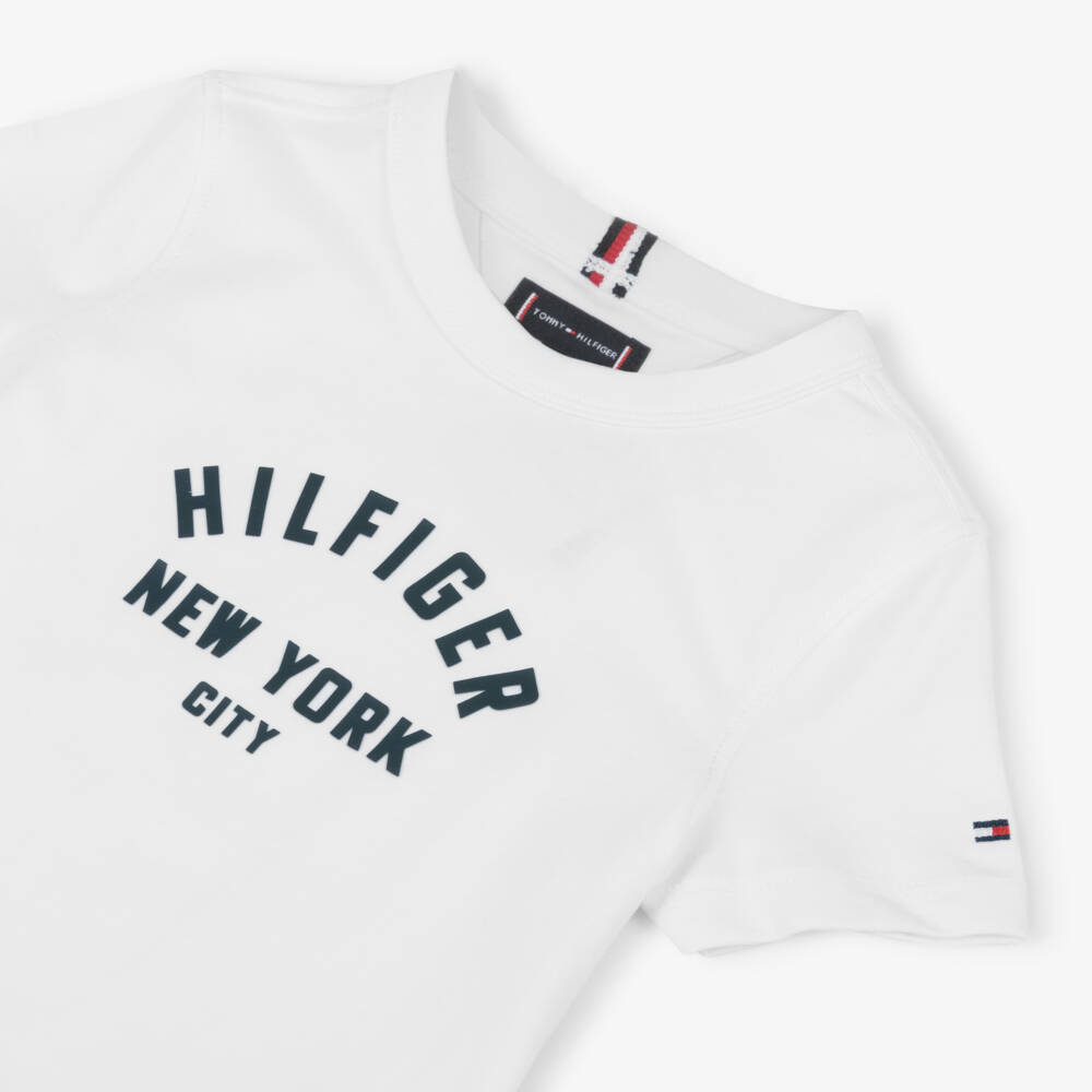 Tommy Hilfiger-Boys White Cotton T-Shirt with Navy Blue Curve Logo | Childrensalon