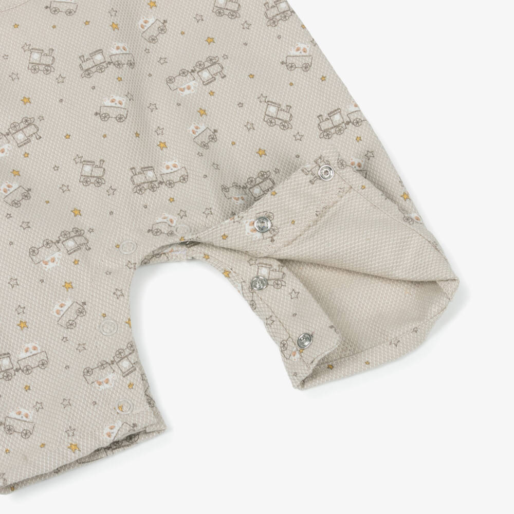 Tutto Piccolo-Baby Boys Beige Cotton Train Print Romper | Childrensalon