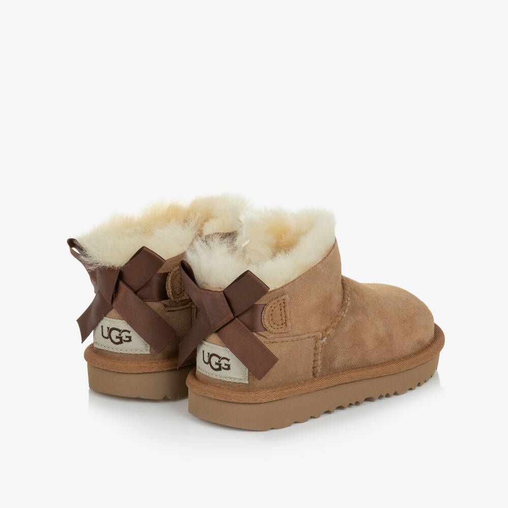 UGG-Girls Chestnut Brown Ultra Mini Bailey Bow Boots | Childrensalon