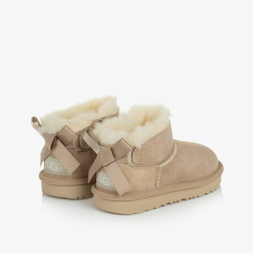 UGG-Girls Sand Beige Ultra Mini Bailey Bow Boots | Childrensalon
