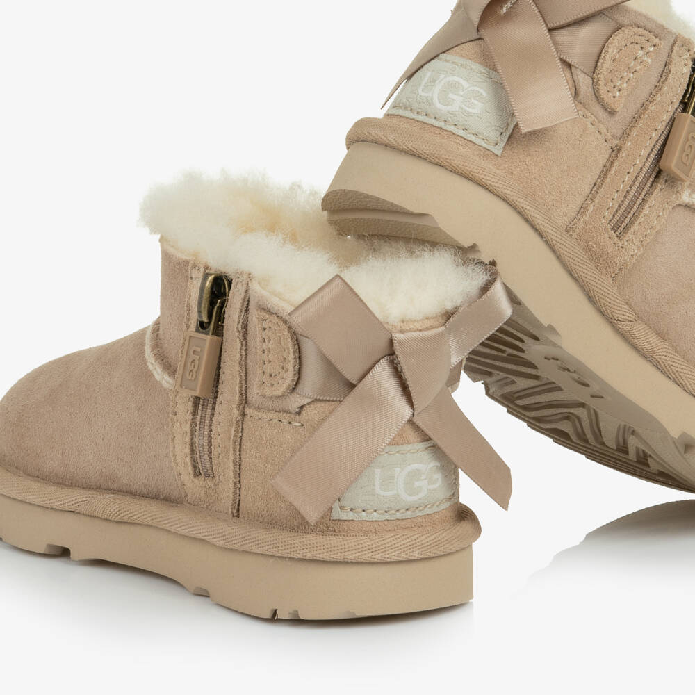 UGG-Girls Sand Beige Ultra Mini Bailey Bow Boots | Childrensalon