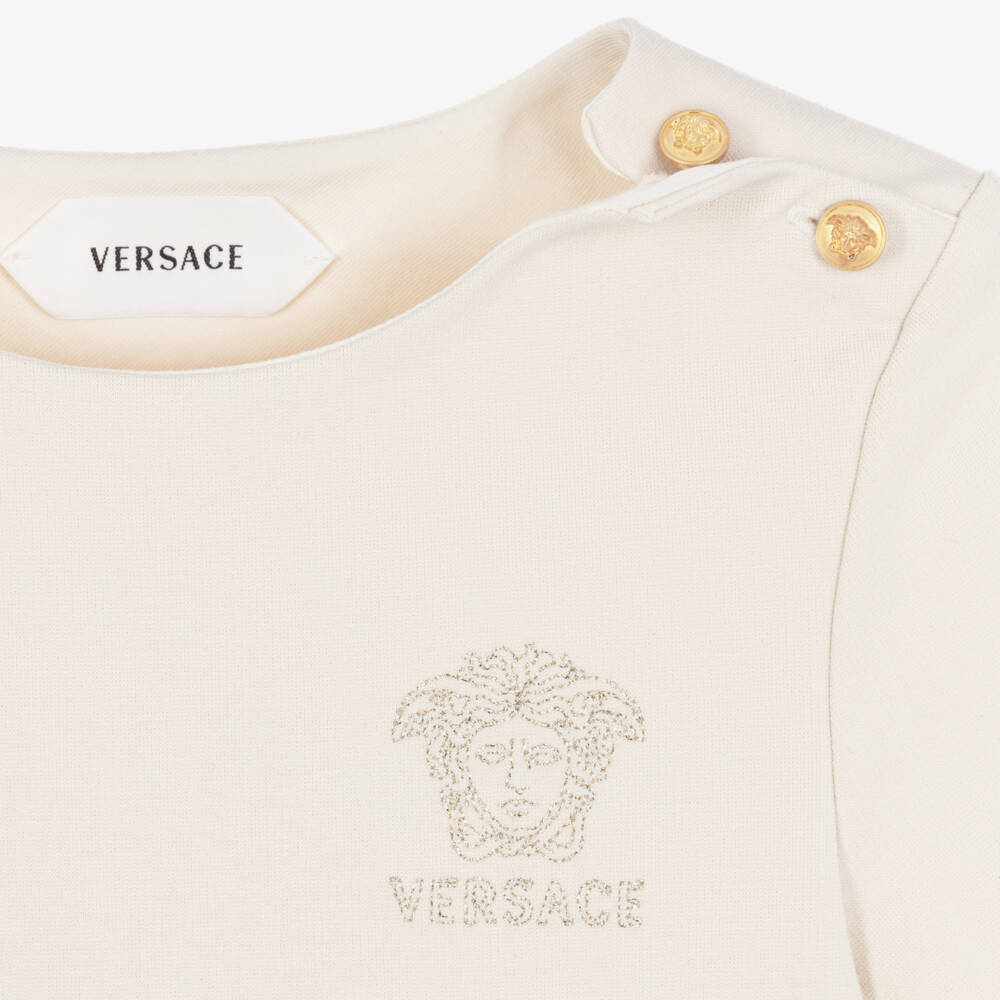 Versace-Girls Beige Milano Jersey Dress with Lurex Medusa | Childrensalon